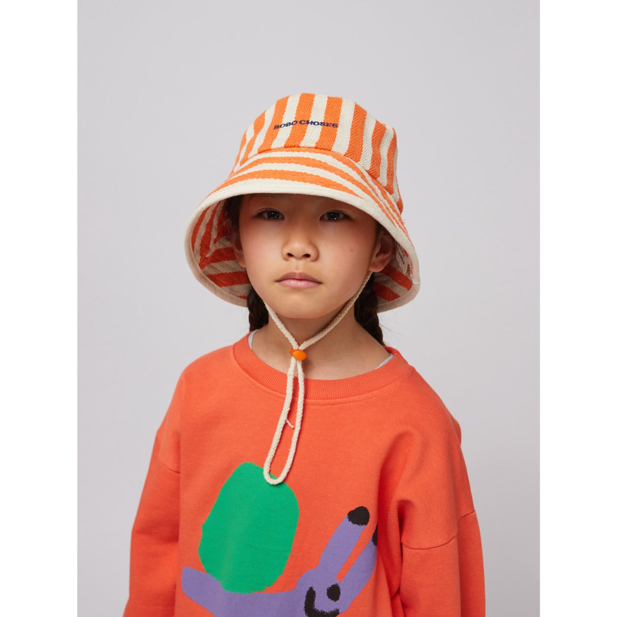 Bobo Choses Orange Striped Hink Mössa