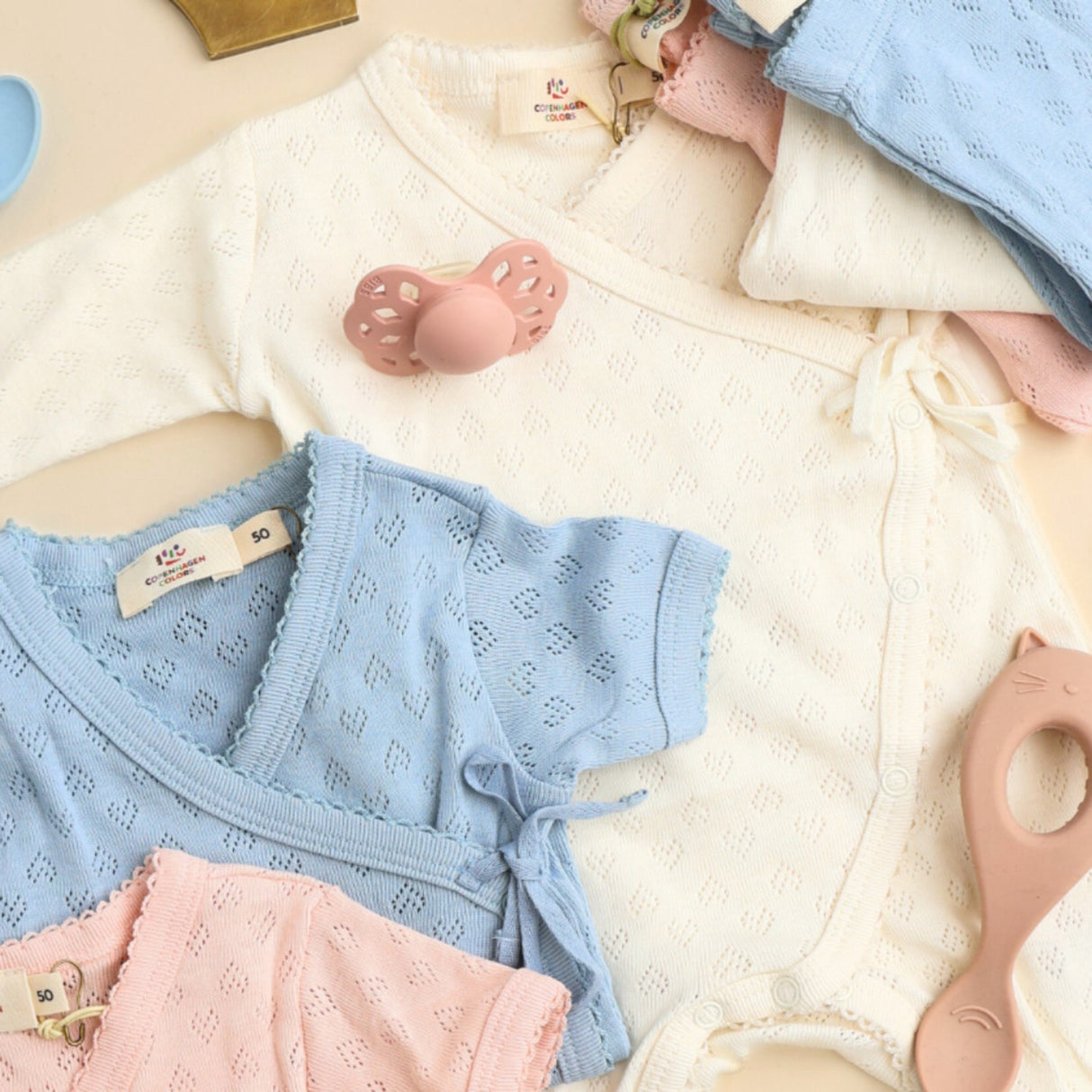 COPENHAGEN COLORS Cream Pointelle Cross-Över Onesie