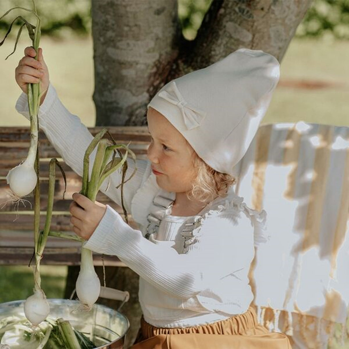 Racing Kids Mössa Vindtät 2-lagers Rosett Eggshell